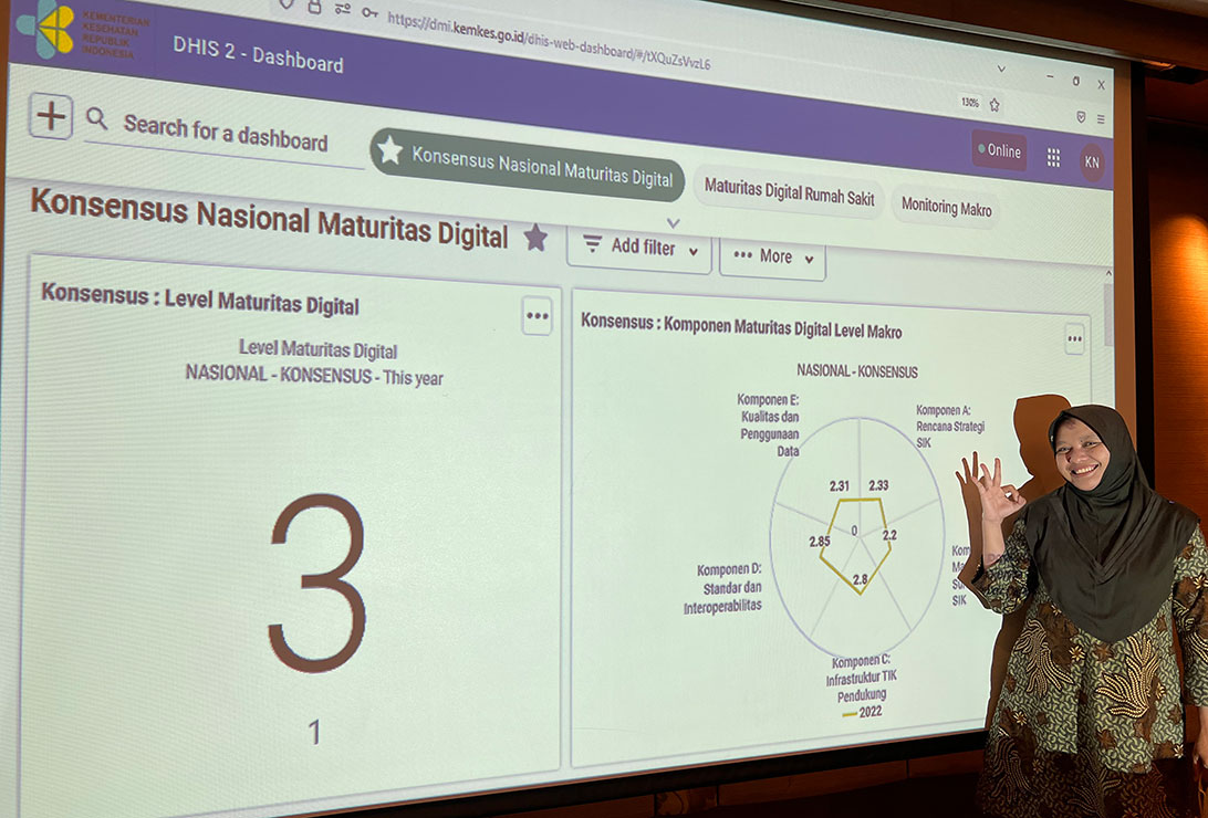 Photograph of a woman giving a data presentation