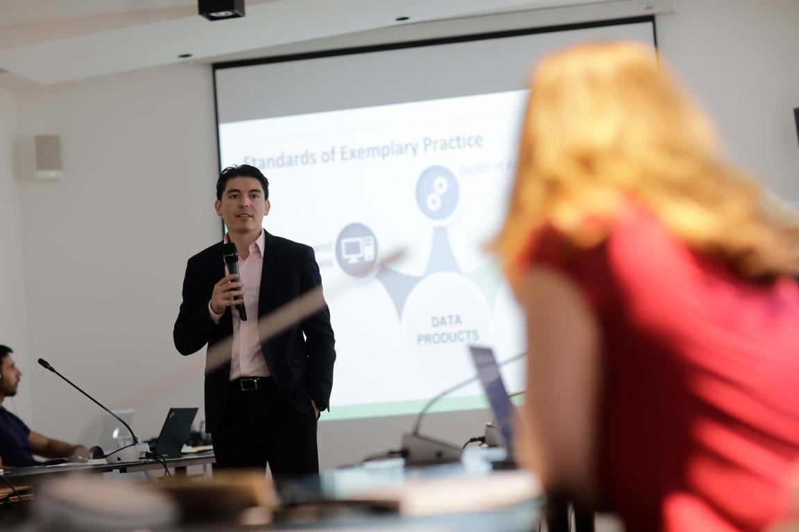 Photograph of a man giving a presentation