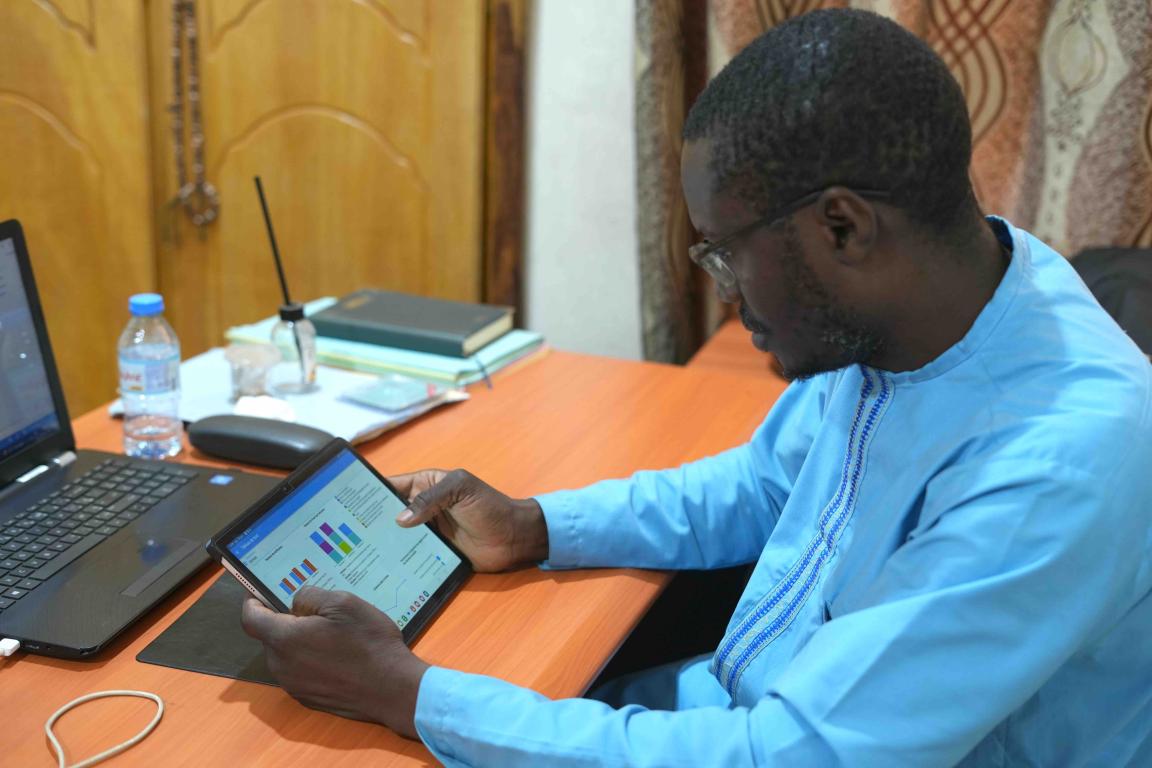 A man works on a tablet