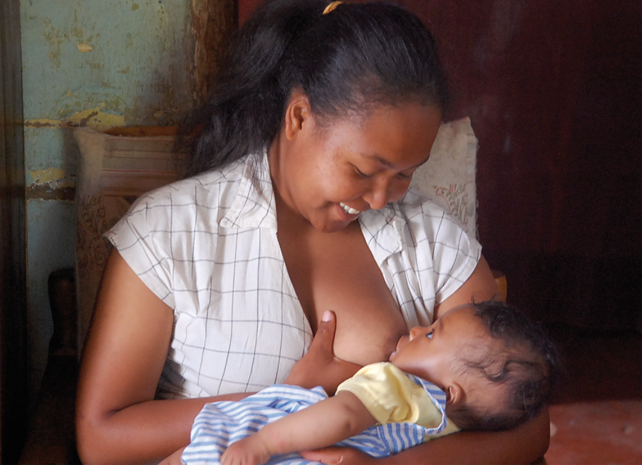 Mother breastfeeding her child