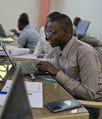 A participant working with data in a training workshop in Niger. 